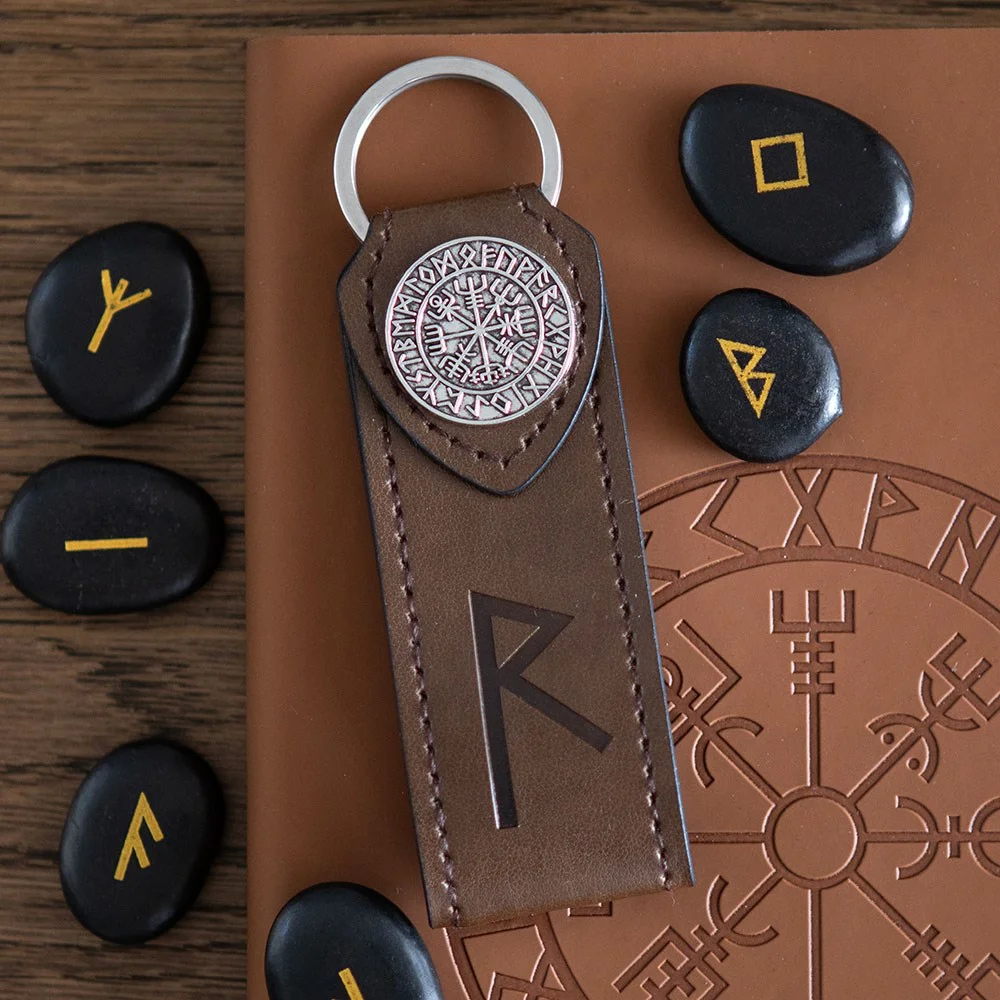 Viking rune keyring with embossed faux leather tab and metal rune symbol, designed for travellers and Viking heritage fans