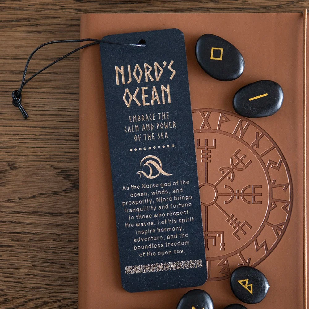 Njord's Ocean wooden bookmark with wave-themed design and natural finish on a white background