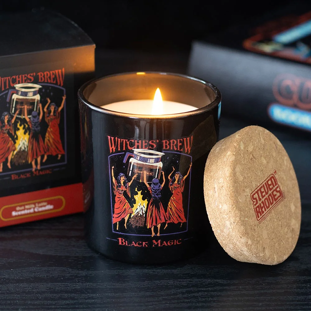 Witches' Brew oat milk latte candle with Steven Rhodes caffeine coven artwork on white jar with black lid