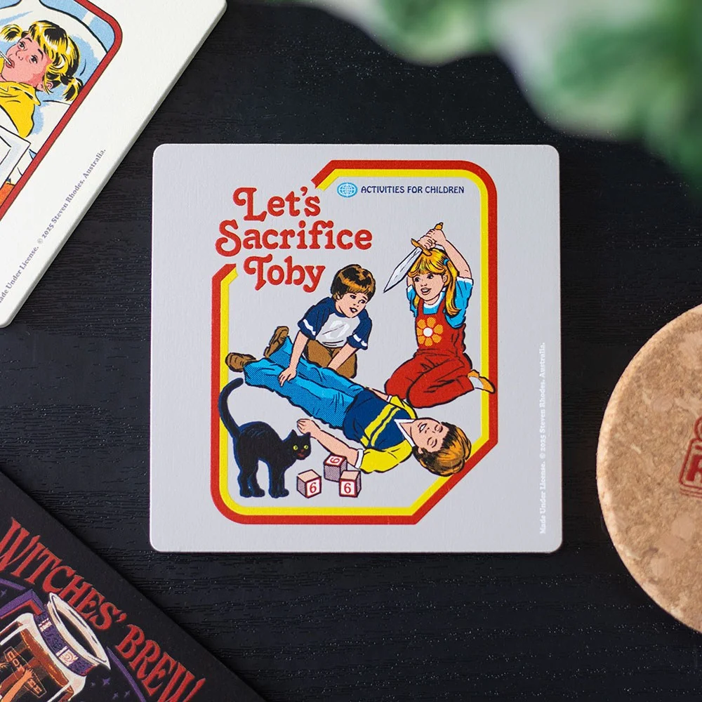 Let's Sacrifice Toby novelty drink coaster featuring quirky ritual sacrifice design by Steven Rhodes on wooden table