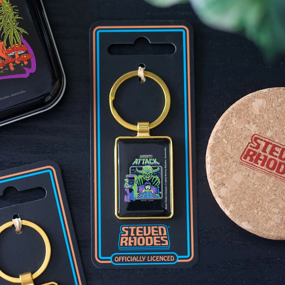 Anxiety attack keyring featuring retro arcade-style goblin and nightmare design by Steven Rhodes on enamel keyring