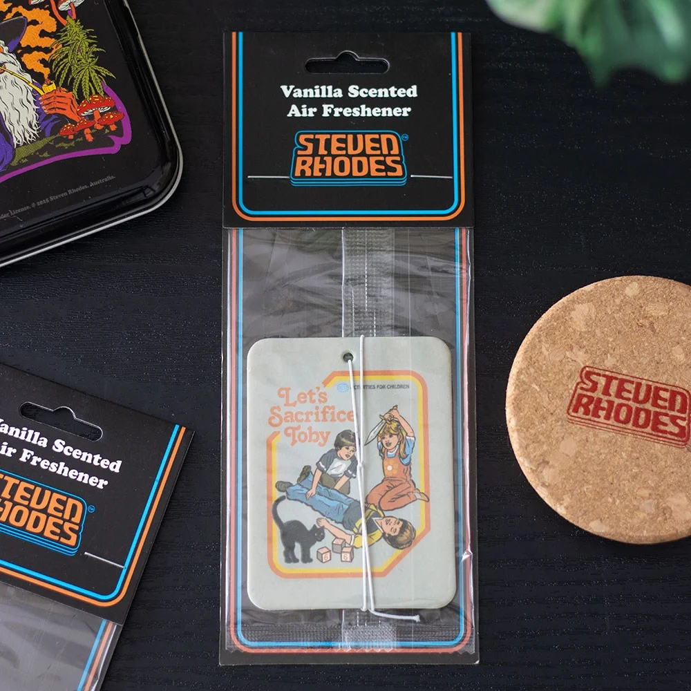 Let's Sacrifice Toby vanilla air freshener by Steven Rhodes with retro artwork, hanging on a car vent