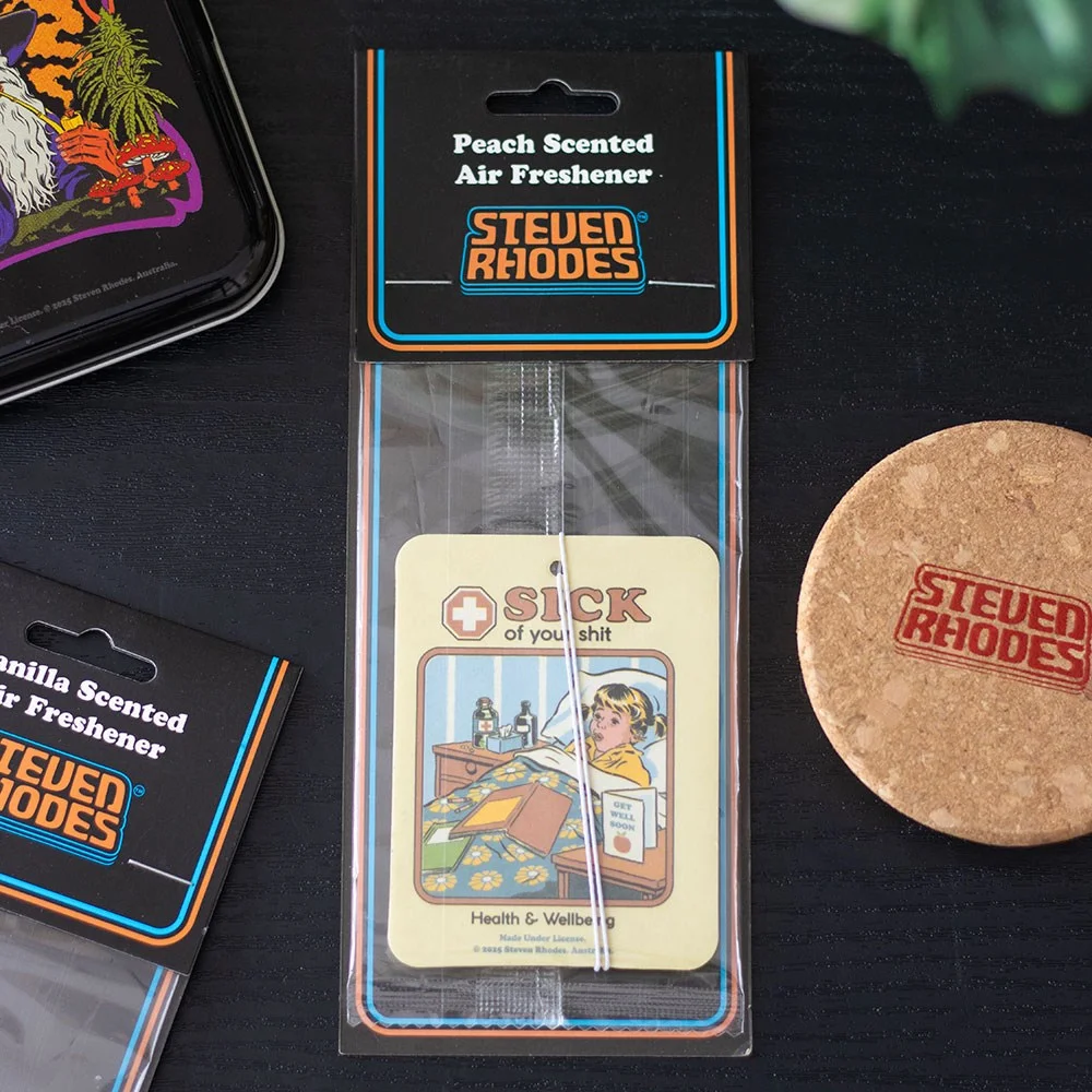 Peach air freshener shaped like a retro cartoon character with "Sick of Your Shit" text by Steven Rhodes