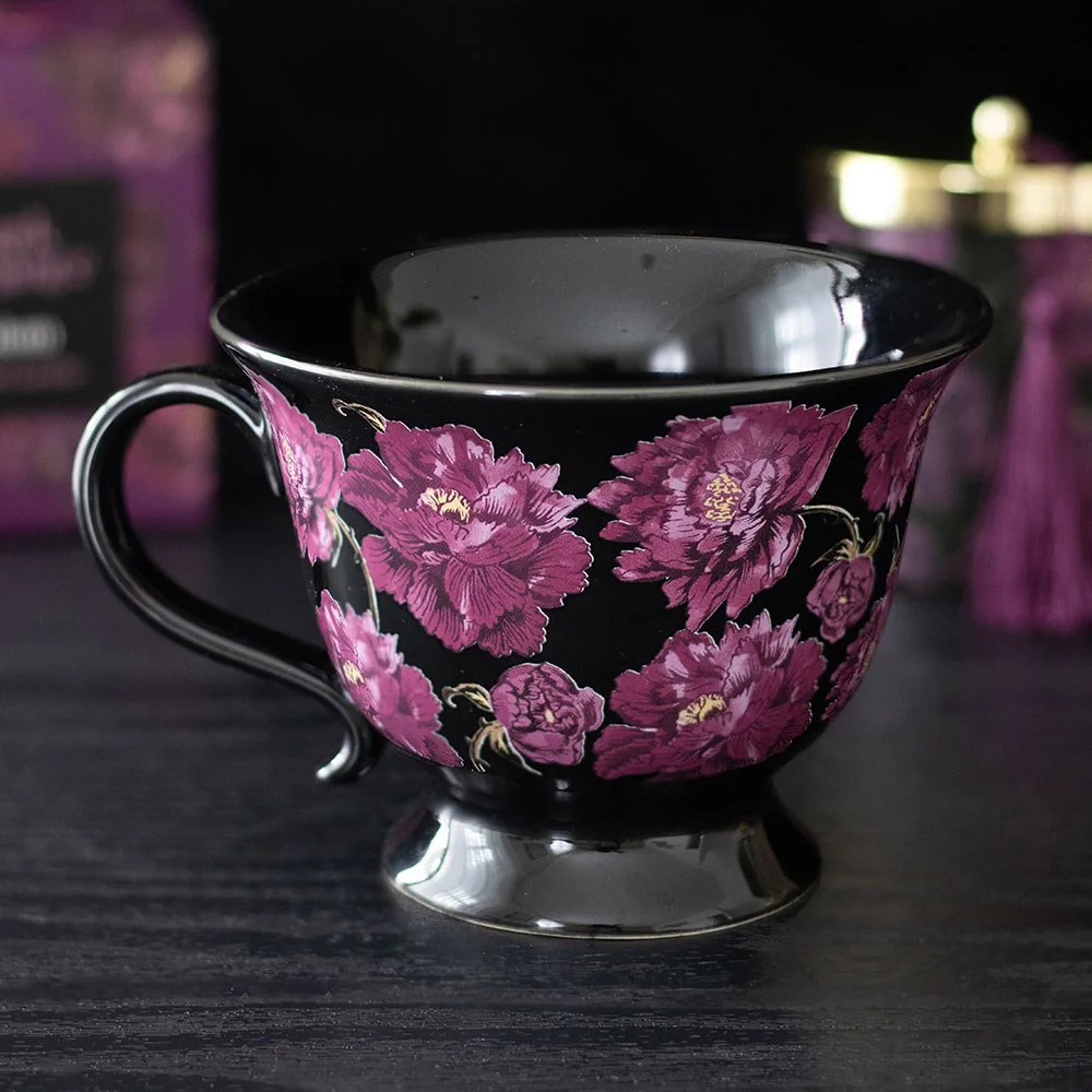 Ceramic dark floral teacup with deep rose and purple blooms on black background, 320ml capacity