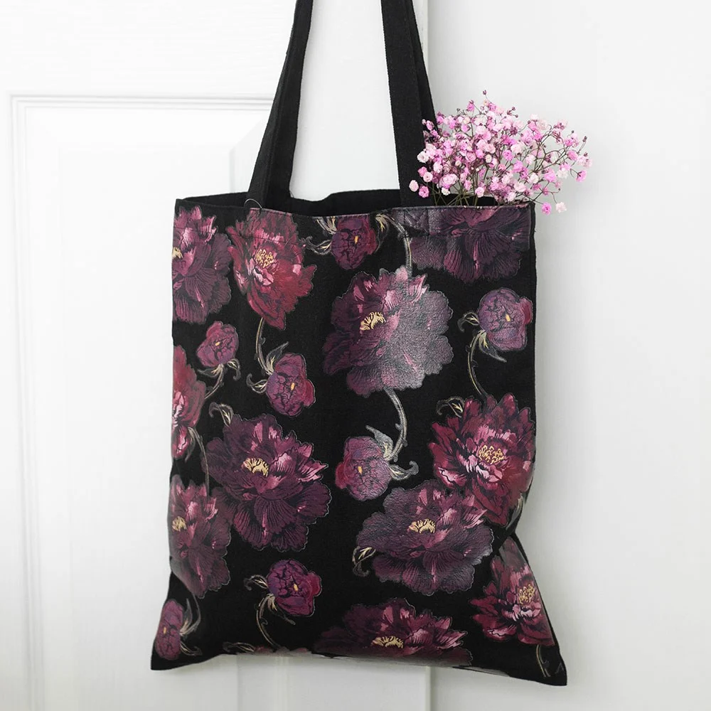 Dark romance tote bag with gothic rose floral print in dusky purple, spacious fabric tote for everyday use