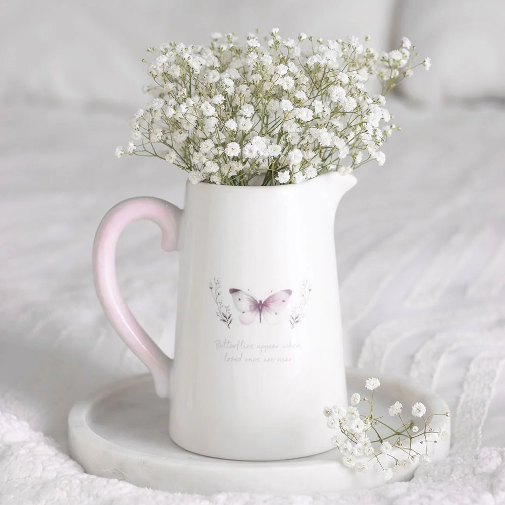 White ceramic flower jug with grey butterfly print and heartfelt quote, ideal for fresh or dried flowers display