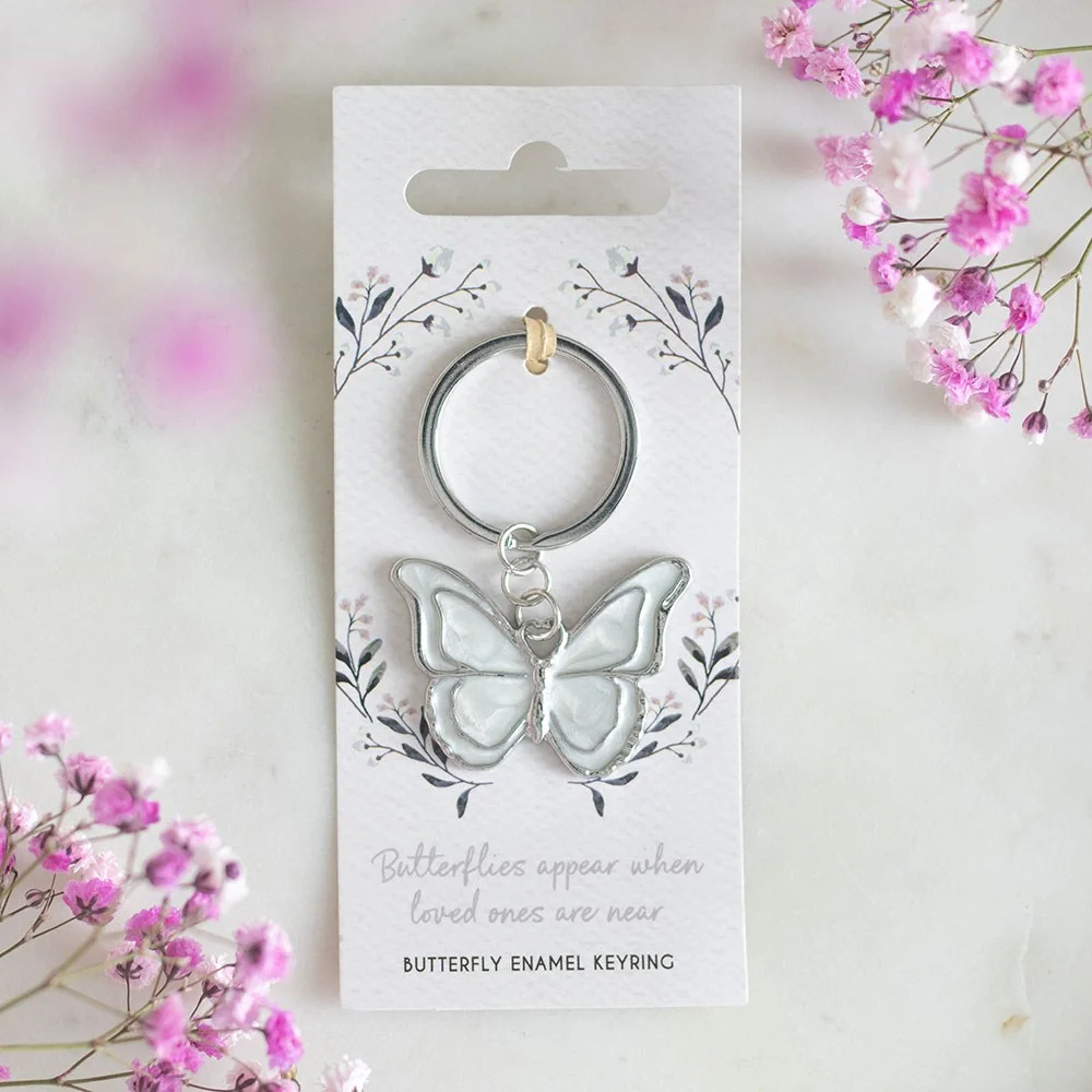 Alloy and enamel butterfly keyring on card with message "Butterflies appear when loved ones are near