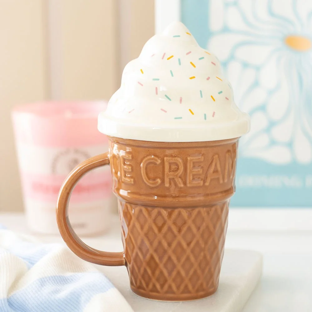 Ceramic ice cream cone mug with swirled lid, 500ml capacity, playful design perfect for novelty drinkware gifts