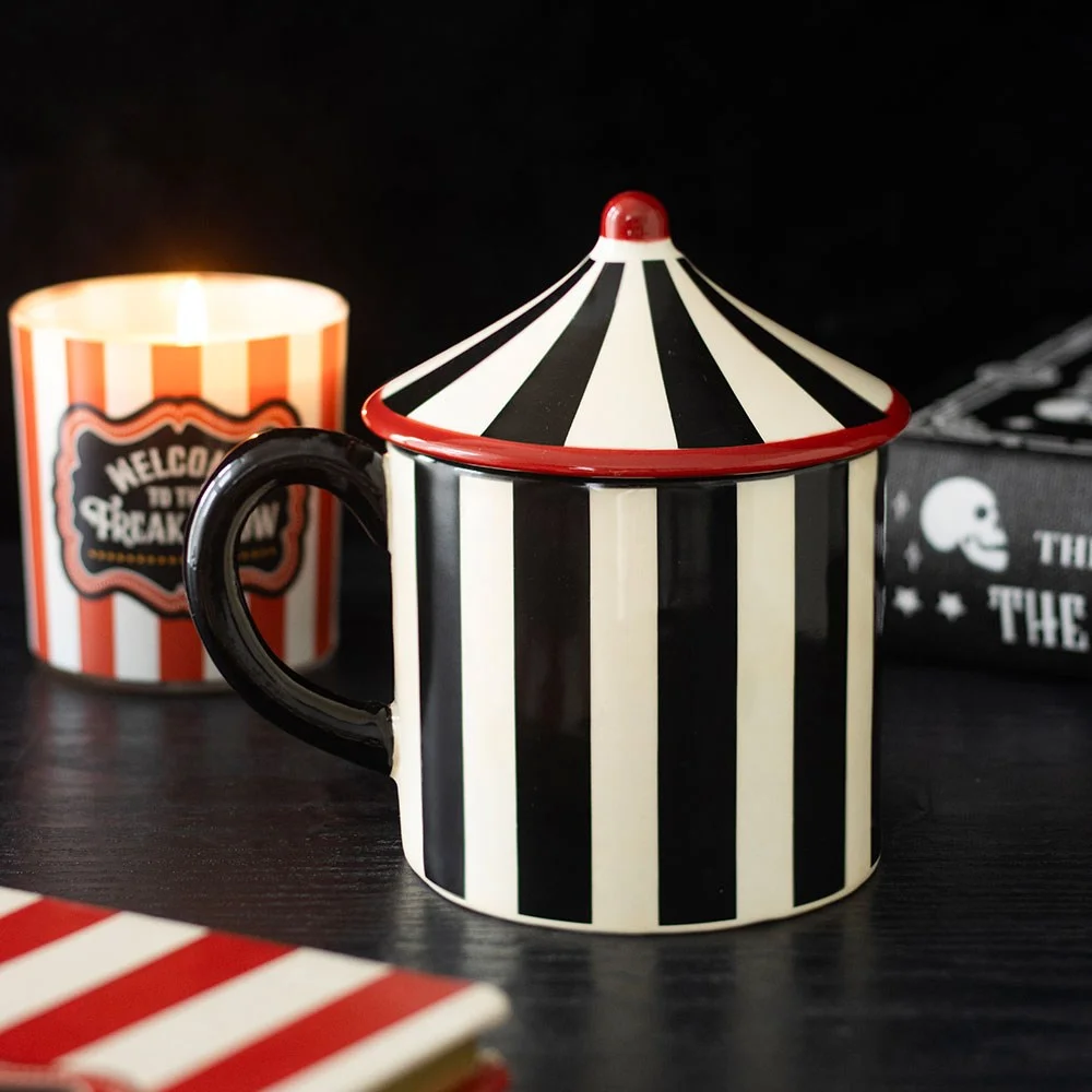 black striped mug with pointed lid, circus tent design, 370ml capacity, hand wash only.