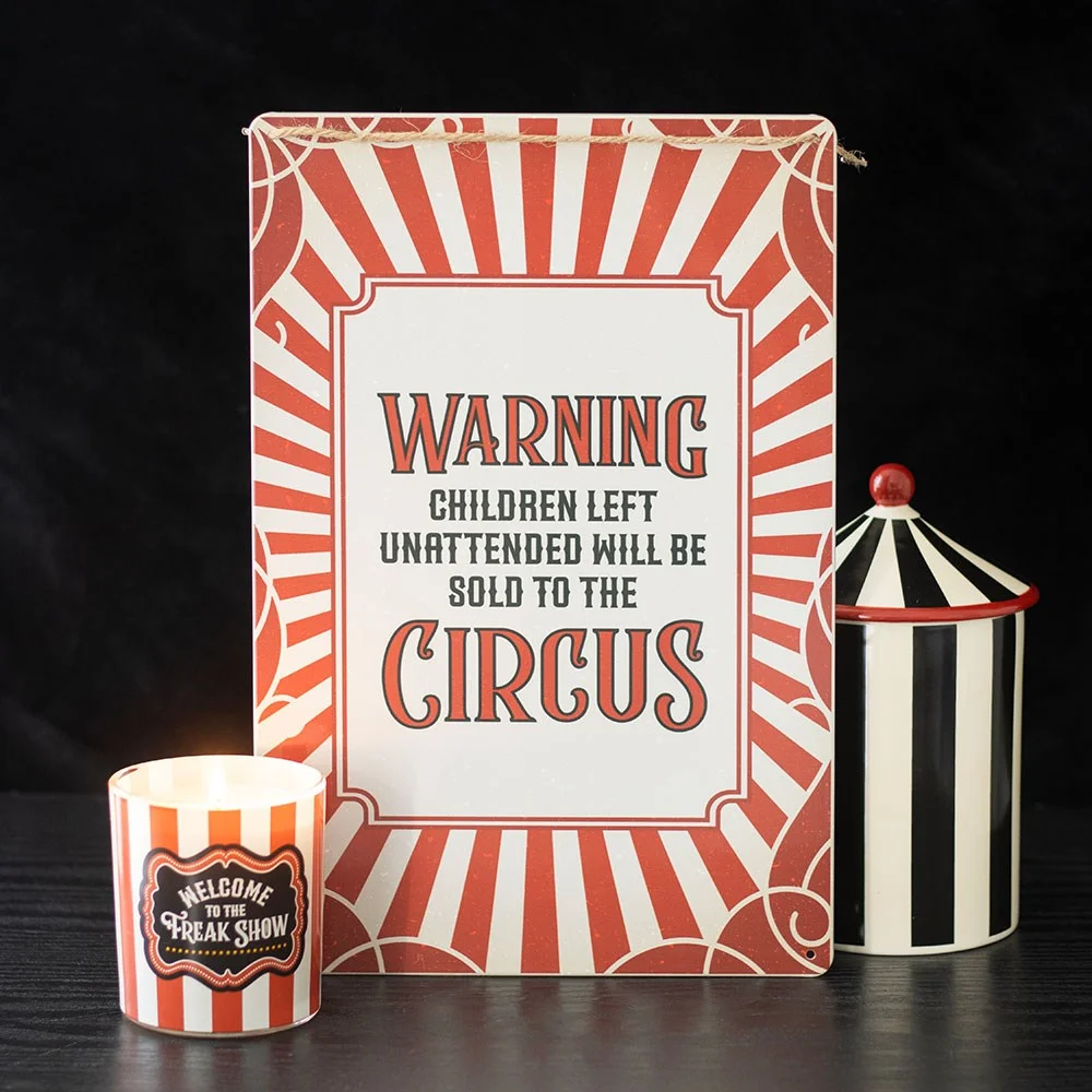 Striped metal sign warning children may be sold to the circus – a funny metal wall sign for quirky décor.