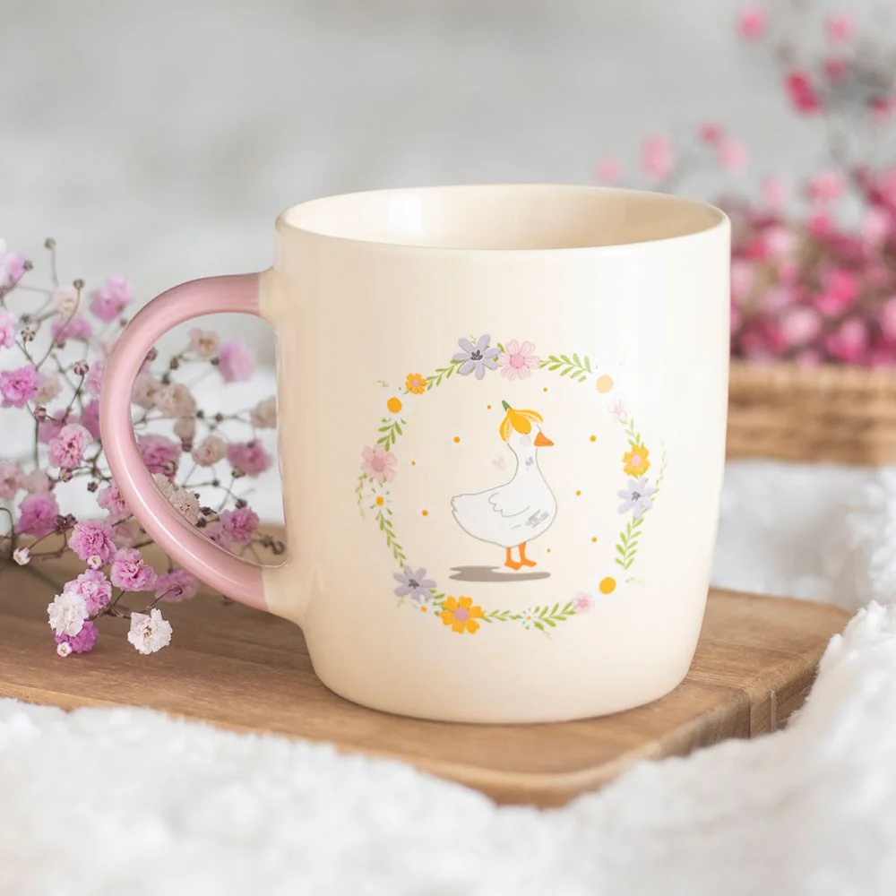 White floral duck mug with a cute duck inside a pastel floral wreath, 320ml, microwave and dishwasher safe