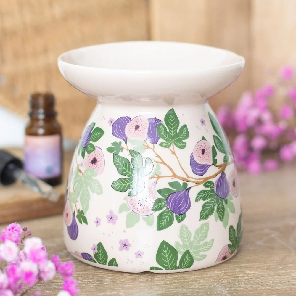 Ceramic oil burner with sweet fig tree print, designed for scented oil diffusion in home spaces