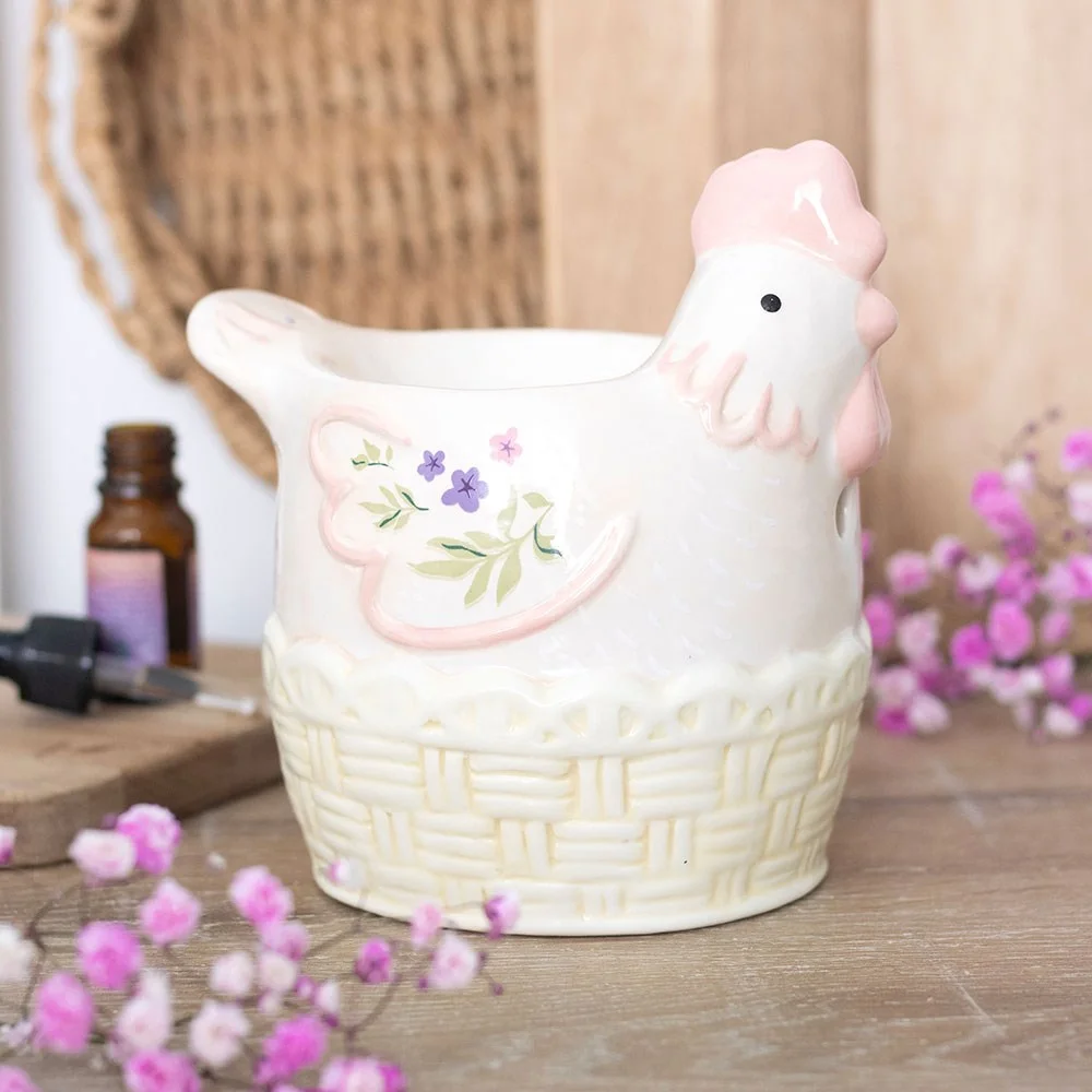 Pastel hen oil burner with floral details and basket weave base, designed for wax melts or fragrance oil with tealight slot