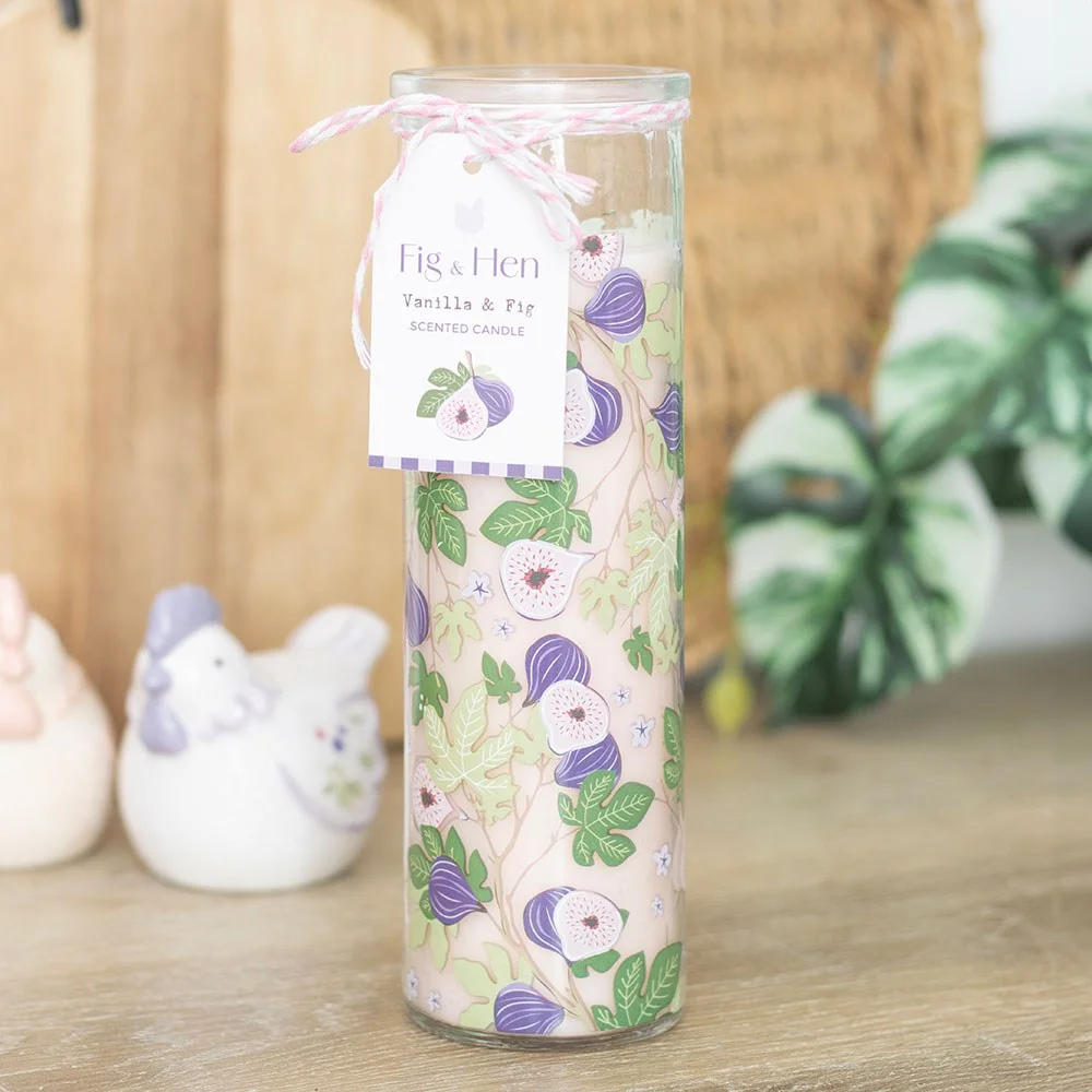 Tube candle vanilla fig with playful fig tree print on white background, decorative and practical home fragrance item