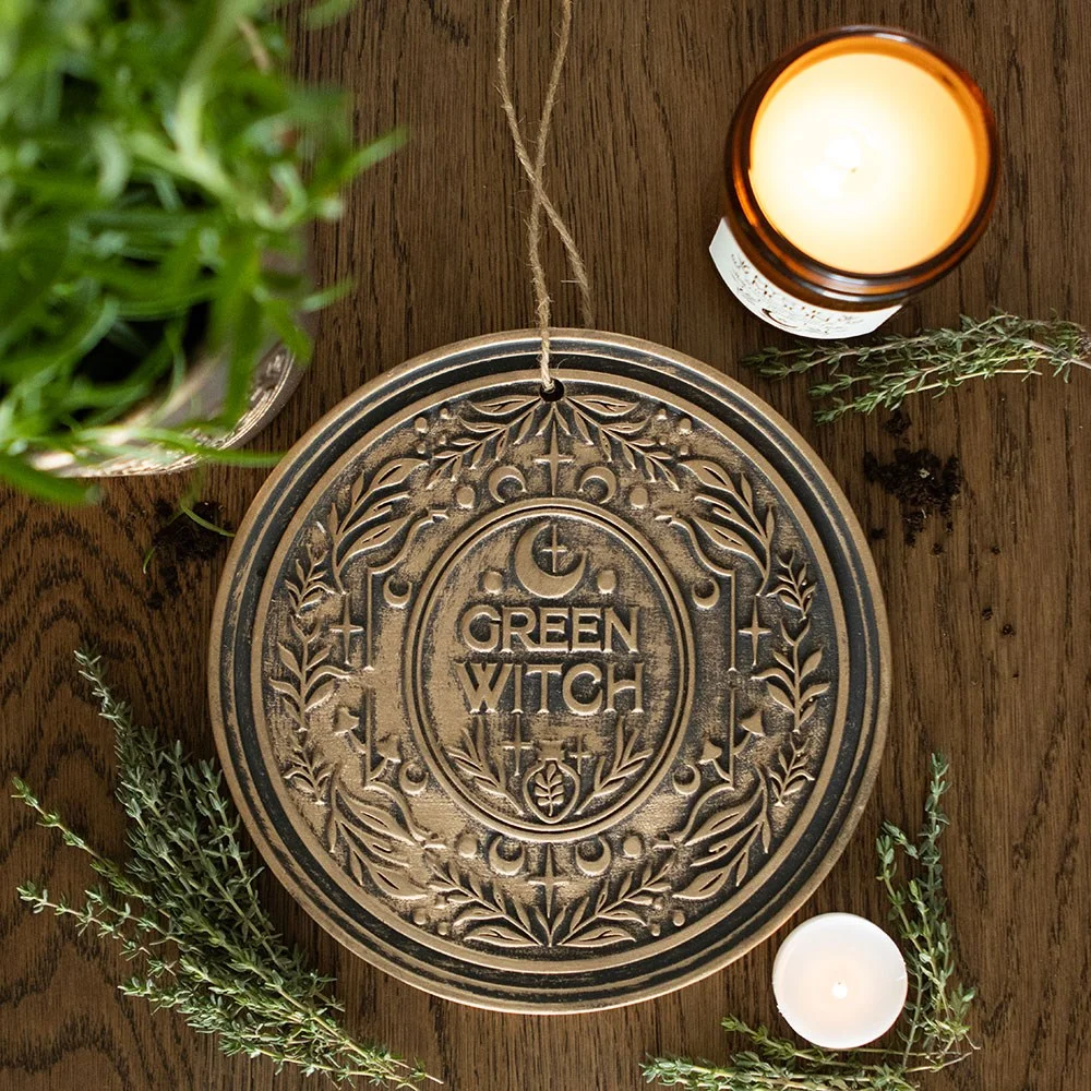 Bronze effect terracotta green witch hanging plaque with mystical design, ideal for hanging in home or garden spaces