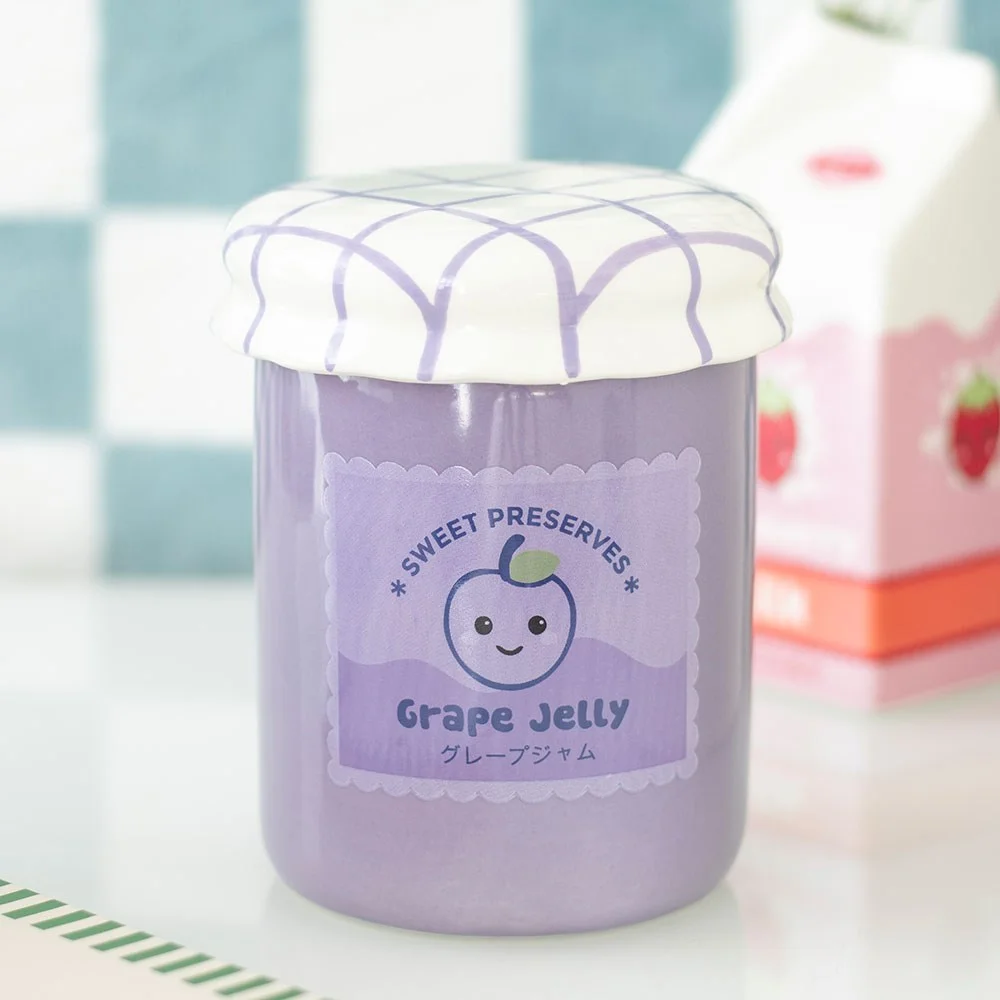 Grape‑jelly jar shaped ceramic oil burner with removable lid, purple glossy ceramic design.