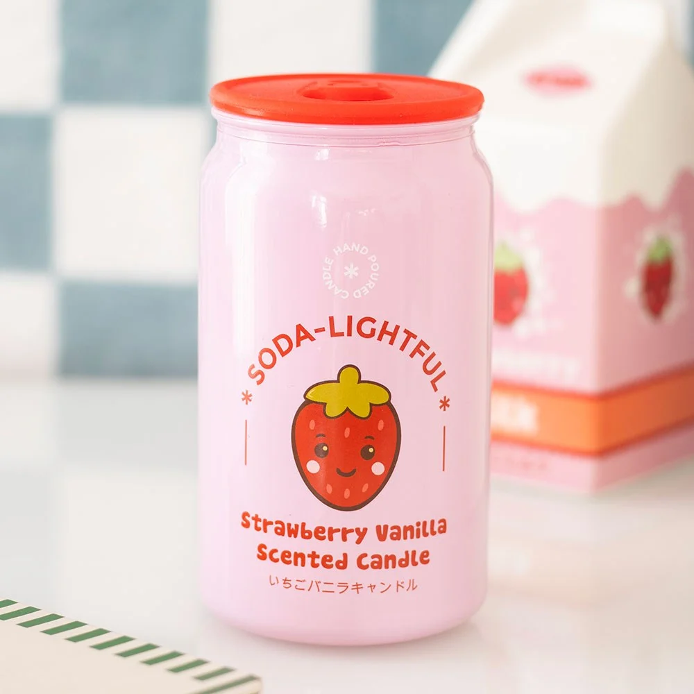 Strawberry vanilla candle shaped like a pink soda can, featuring a kawaii strawberry on top