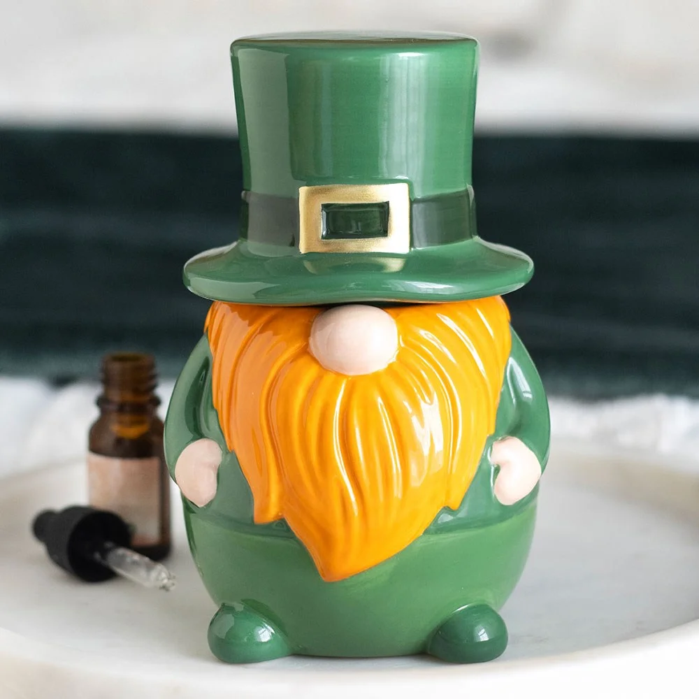 Cheerful leprechaun oil burner with bearded leprechaun in green, tall hat lid, ready for fragrance oil.