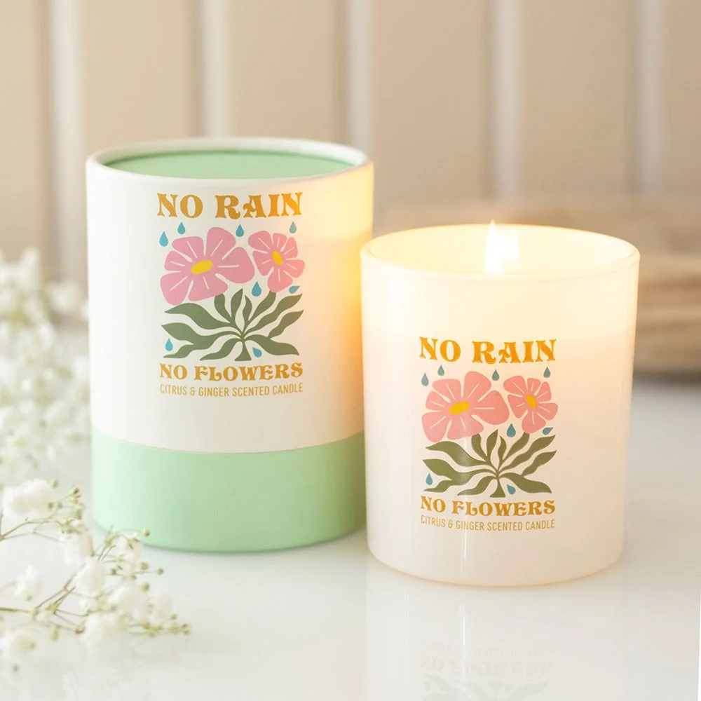 Retro-style citrus ginger candle with white paraffin wax, labeled "No Rain No Flowers".