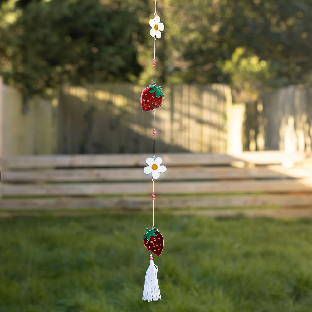 Red strawberry and yellow daisy resin suncatcher string with colourful beads and a white tassel, perfect for bright windows.
