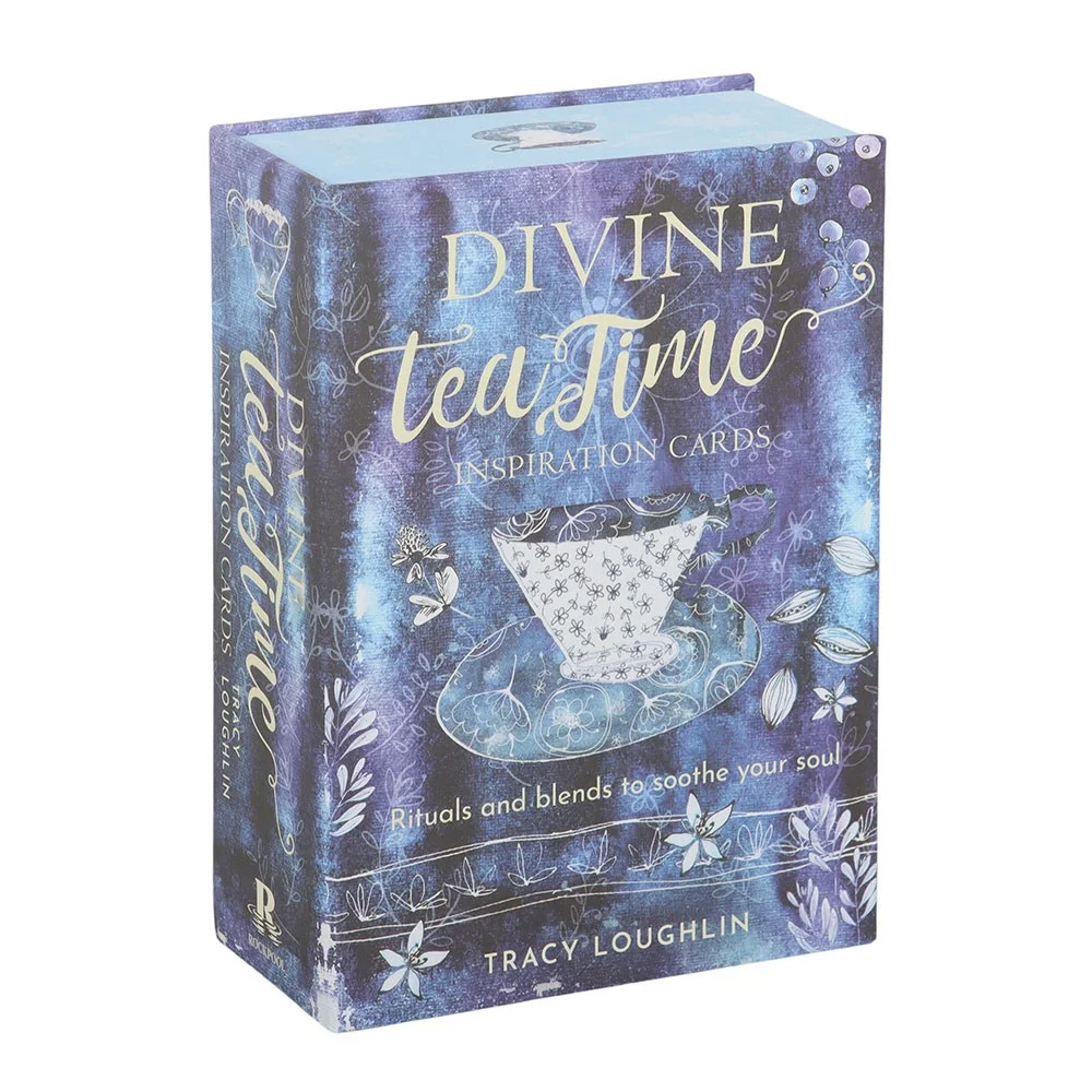 Deck of Divine Tea Time Inspiration Cards with delicate watercolor illustrations and tea recipe themes on a wooden table