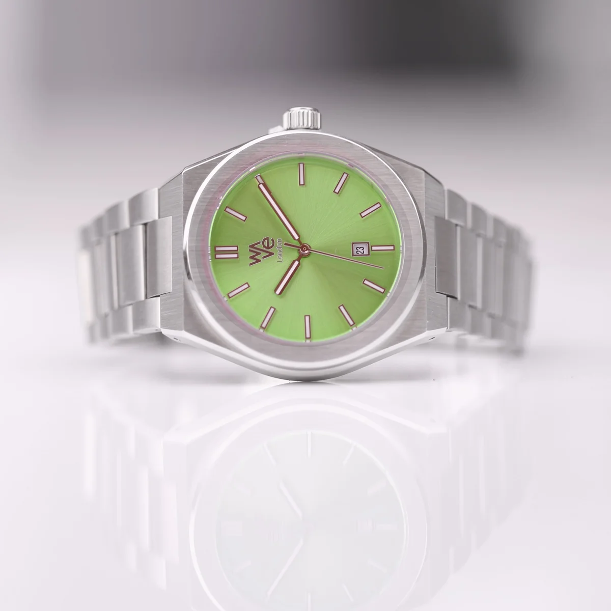 Wave by Architect Lime Surge stainless steel watch with minimalist lime green dial and polished silver band on white background