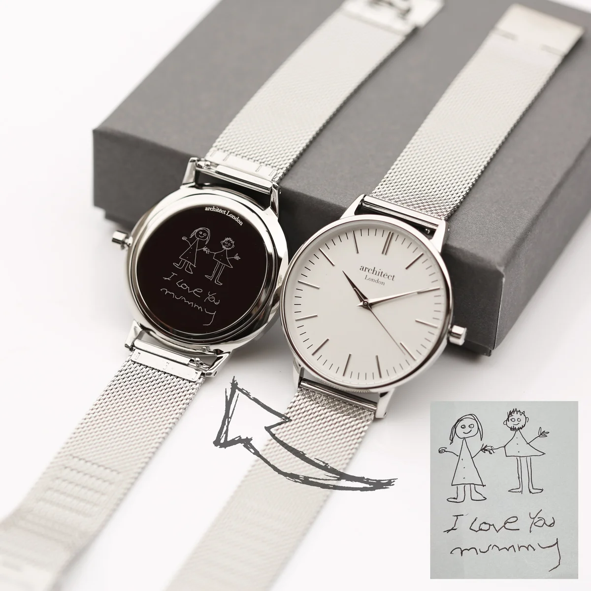Engraved silver bezel watch with silver mesh strap, minimalist white dial, and personalized handwriting engraving on back