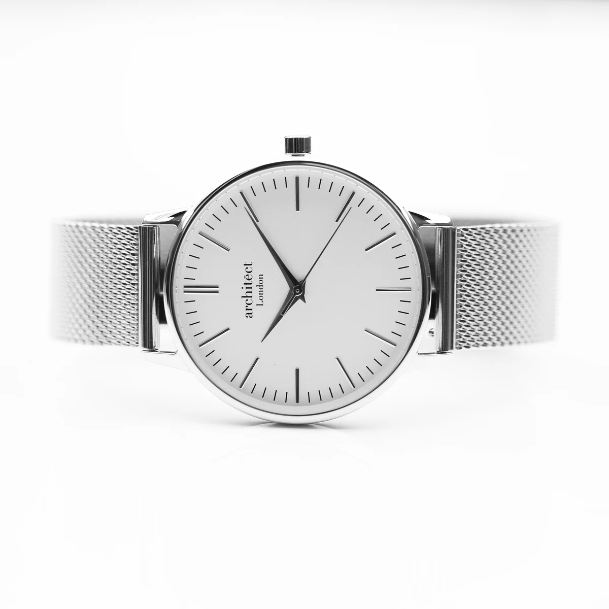 Ladies silver mesh watch with silver bezel, minimalist white dial, and modern font engraving on back case