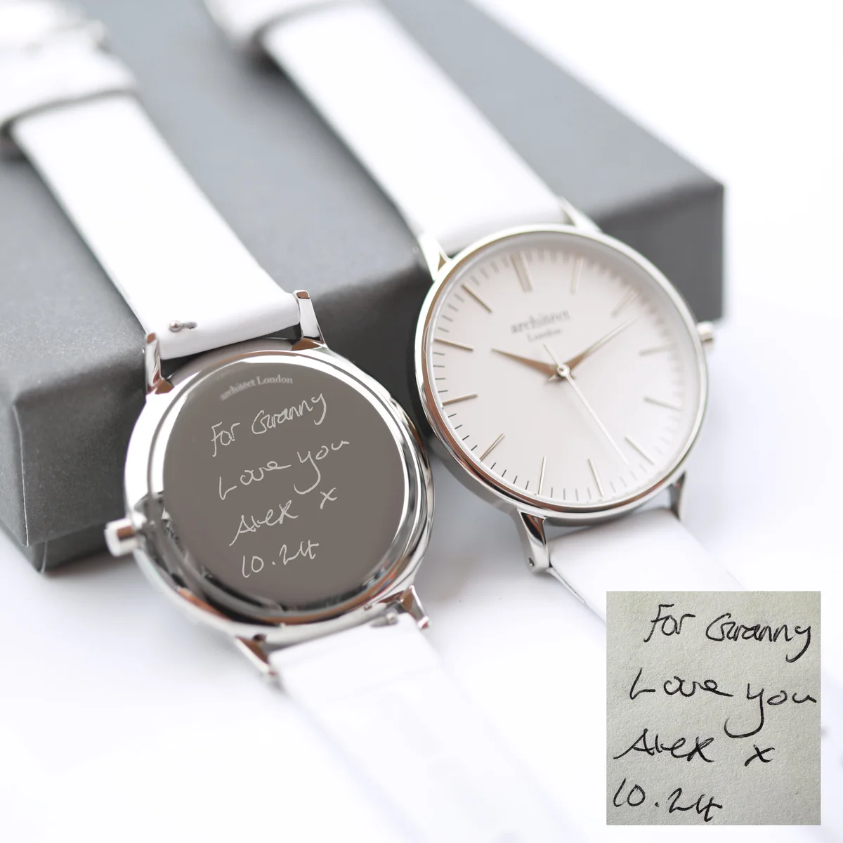 Ladies Architēct Blanc handwriting engraving watch with silver bezel and white leather strap on display box
