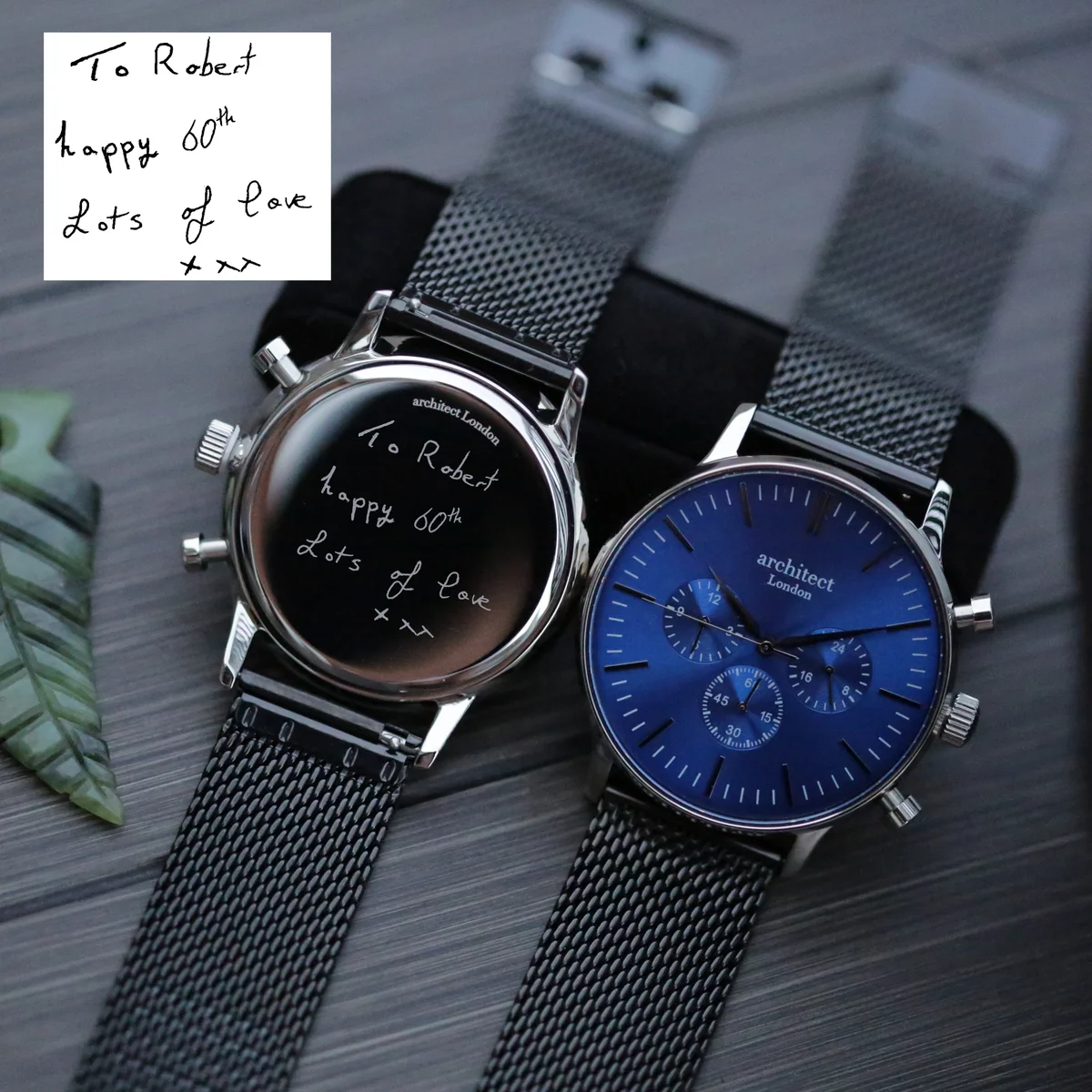 Men's blue face watch with deep-space blue dial, black Milanese mesh strap, and three chronograph subdials on display