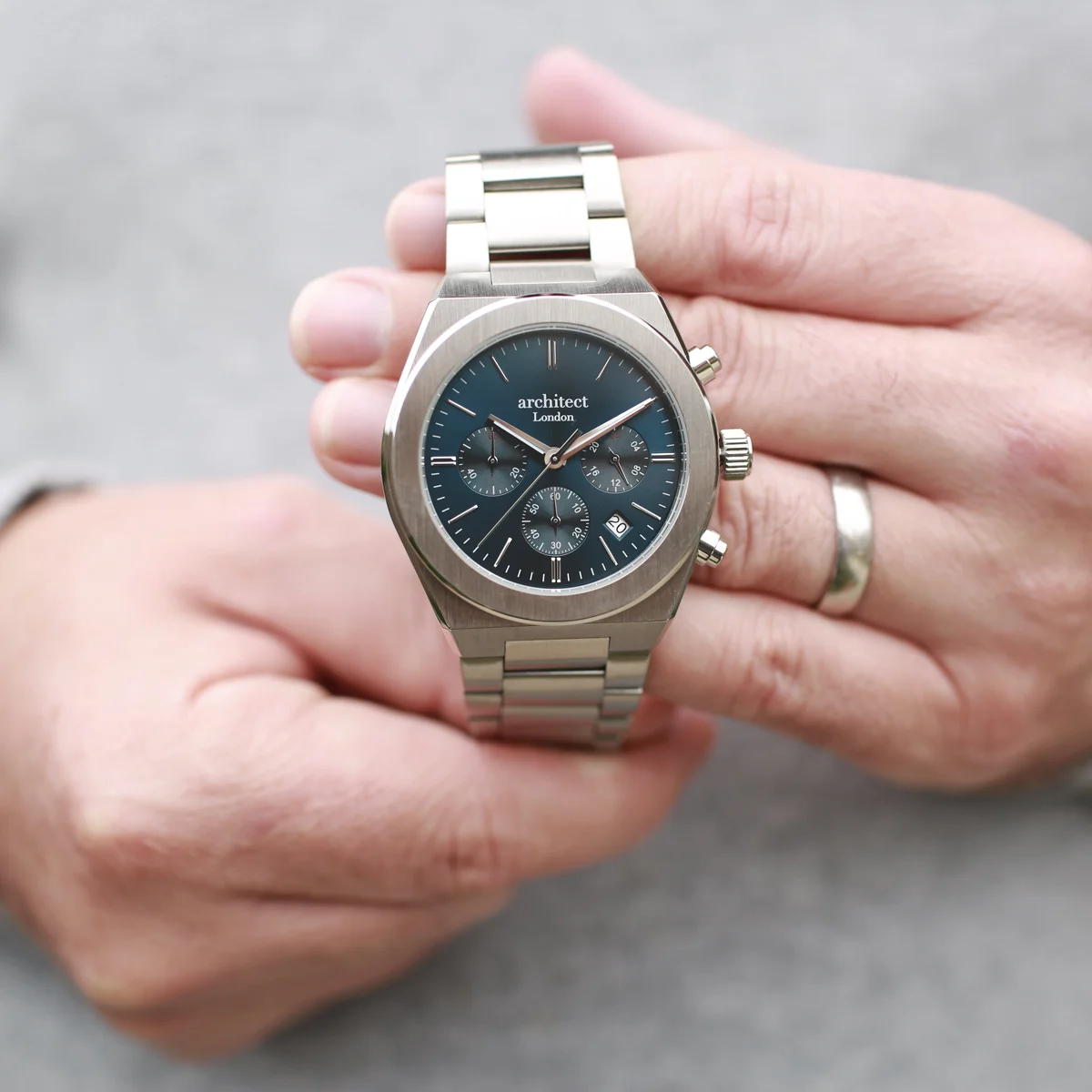 Men's engraved watch Architect Orbix with deep blue dial, silver stainless steel bracelet, and chronograph subdials displayed