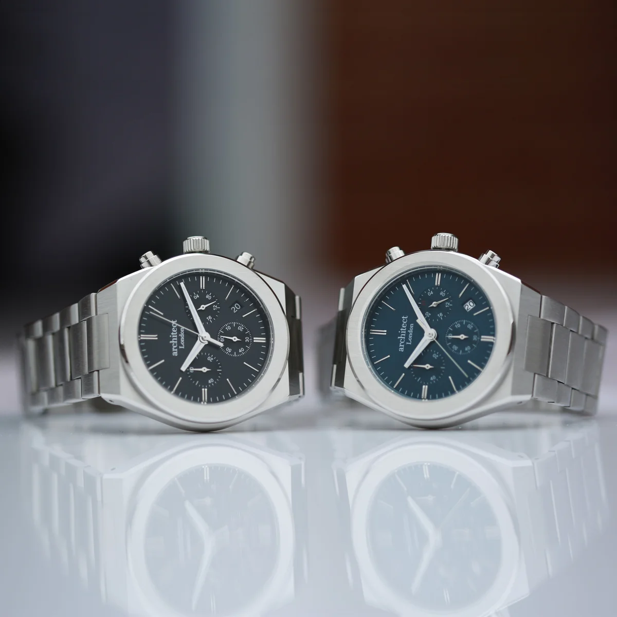 Men’s Architect Orbix blue dial watch with stainless steel bracelet and triple chronograph subdials on white background