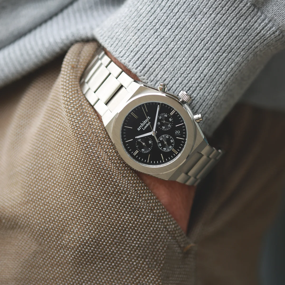 Men's Architect Orbix black watch with stainless steel chronograph, luminous dials, and modern font engraving on back