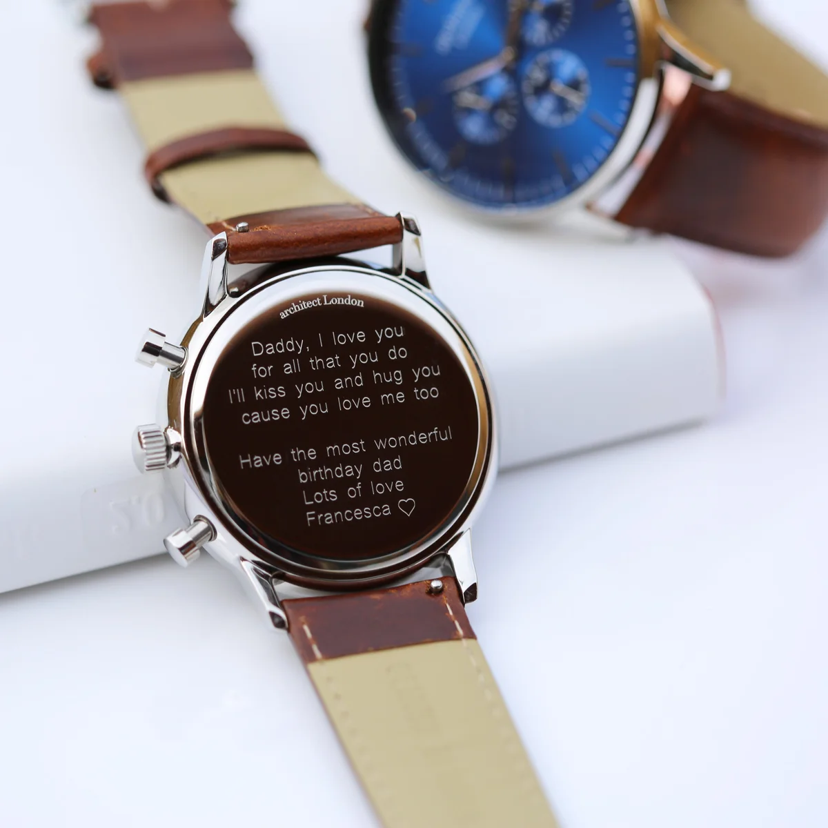 Men’s blue contactless payment watch with walnut strap and modern font engraving on the face