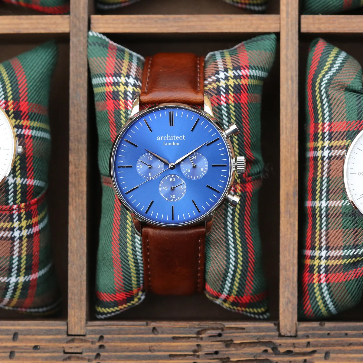Men's blue contactless payment watch with walnut strap and modern font engraving on the face