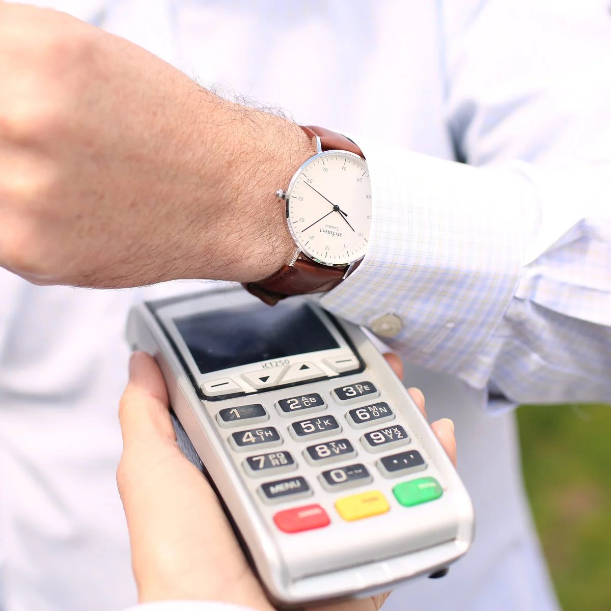 Men's contactless watch with walnut strap and sleek black dial, featuring tap-to-pay technology and engraving option