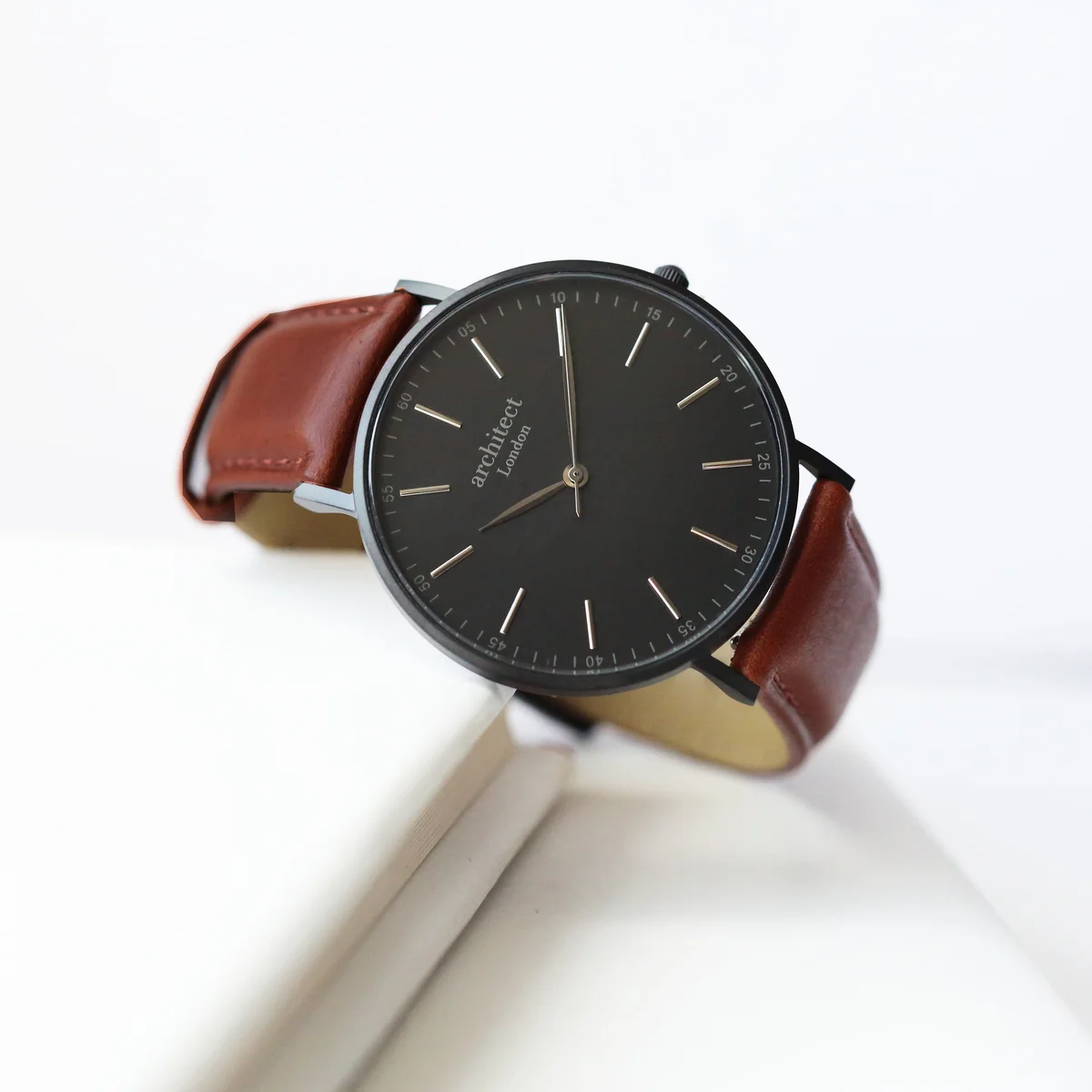 Men's contactless payment watch with minimalist design, walnut strap, and modern font engraving on the face