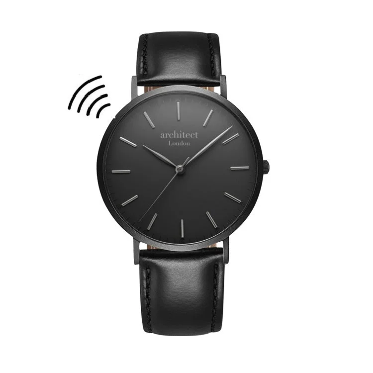 Men's minimalist watch with jet black strap and modern font engraving, featuring contactless payment technology
