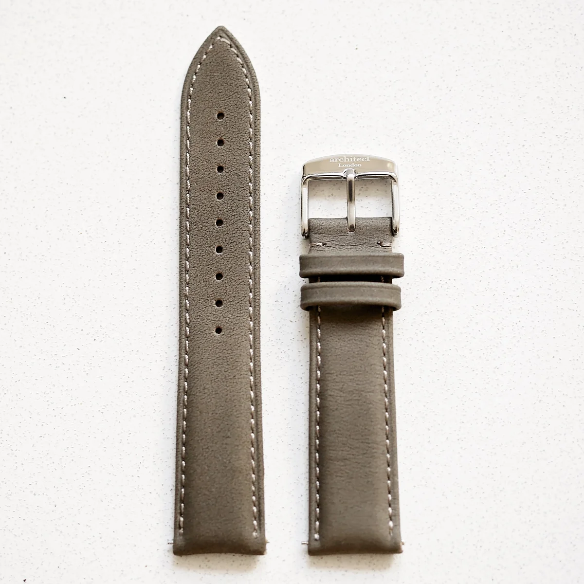 Close-up of a genuine leather watch strap branded Architect London with quick-release snap buckle in 20mm width