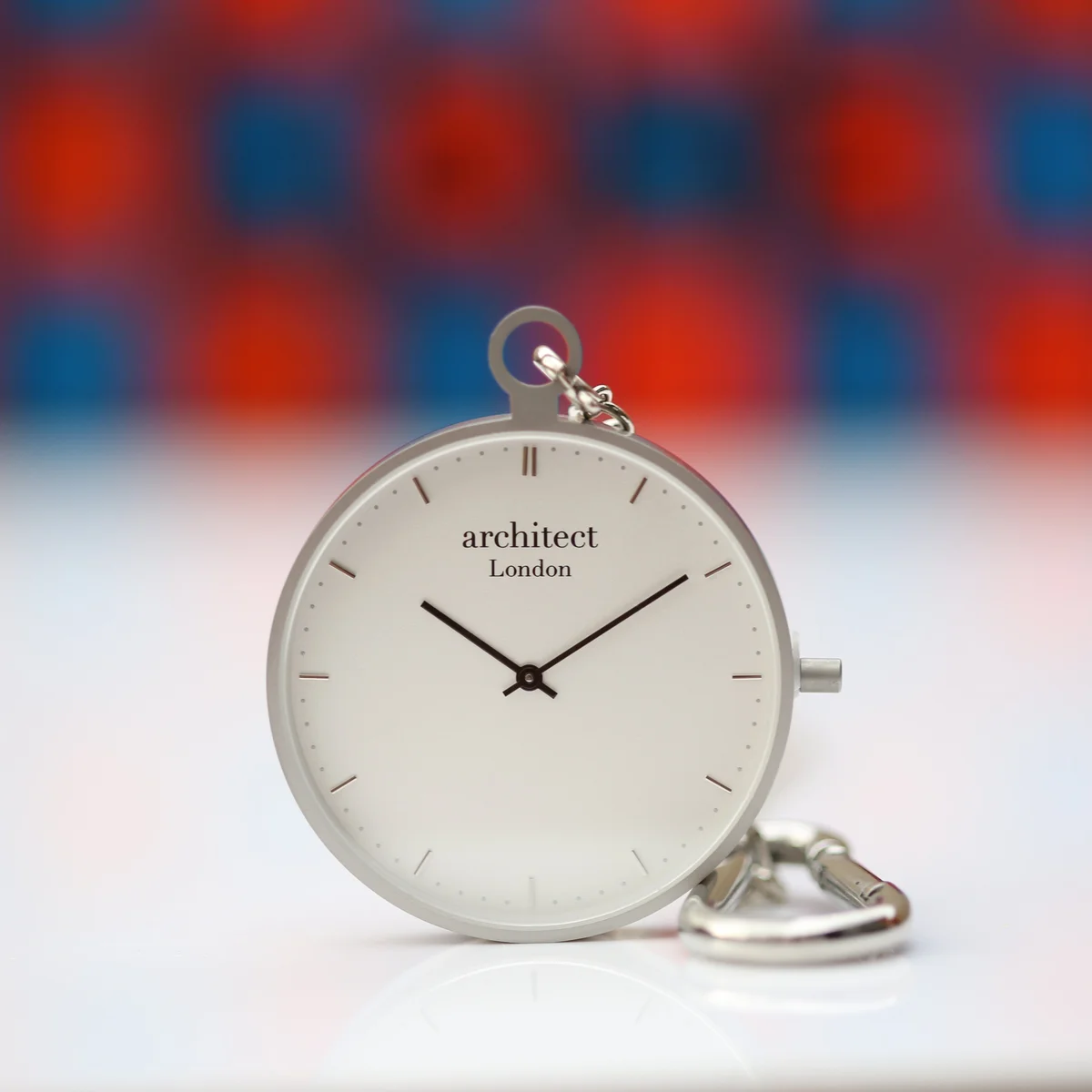 Brushed silver modern pocket watch with sapphire glass and modern font engraving area on the back, shown open