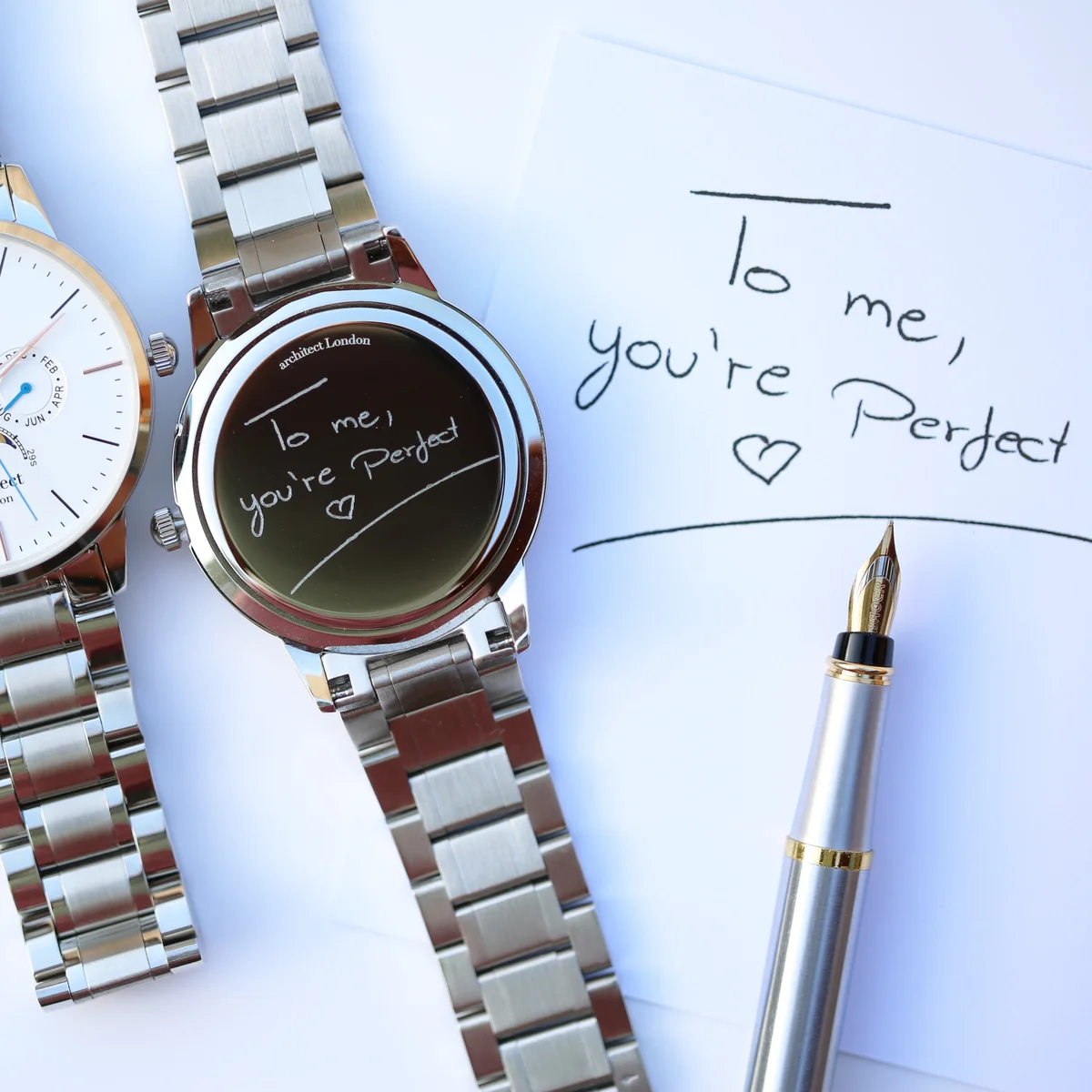 Personalised men's watch with white dial, silver stainless steel band, moonphase and chronograph subdials, engraved back