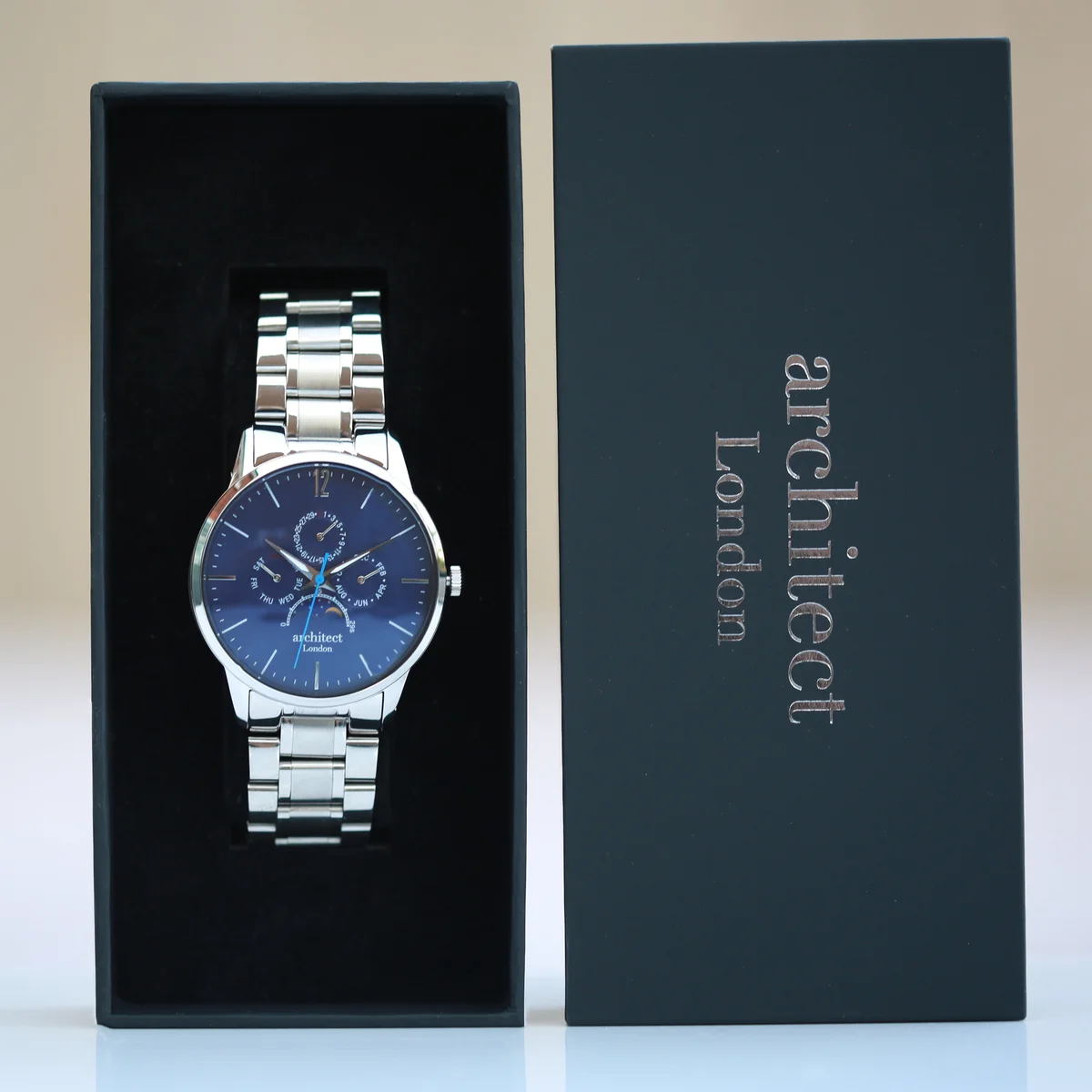 Blue Architect Apollo watch showing chronograph subdials and moonphase on silver stainless steel strap