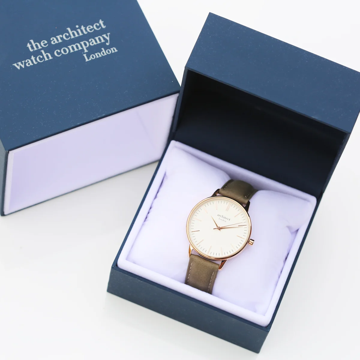 Ladies Architēct Blanc leather strap watch with light grey genuine leather band and polished stainless steel case on white background