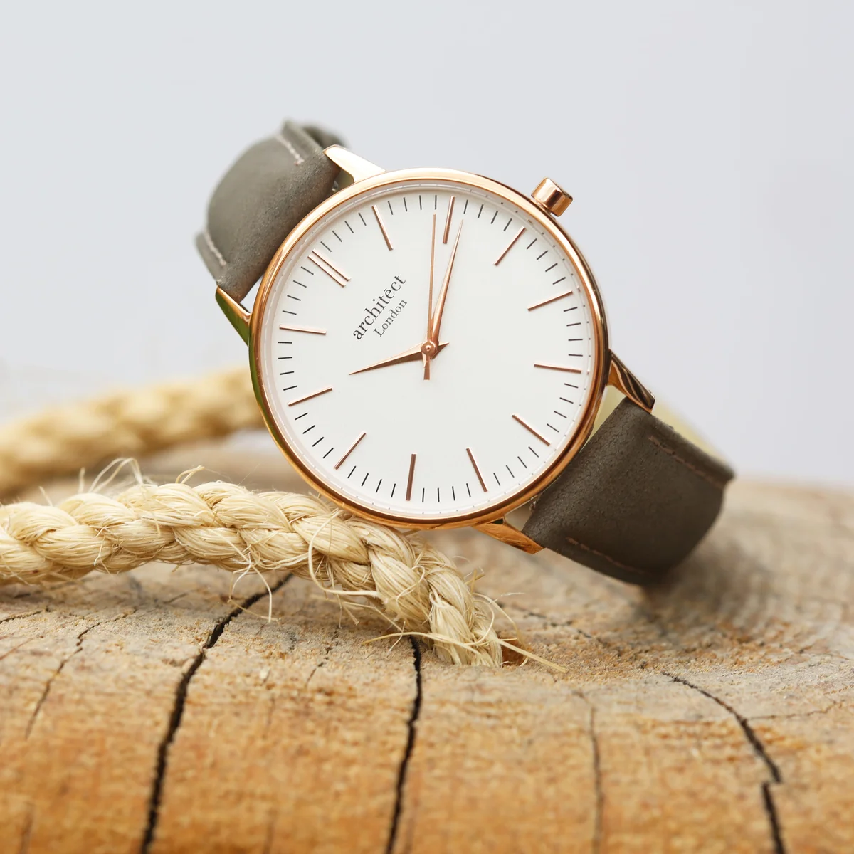 Ladies personalised watch with modern font engraving on stainless steel case and light grey genuine leather strap