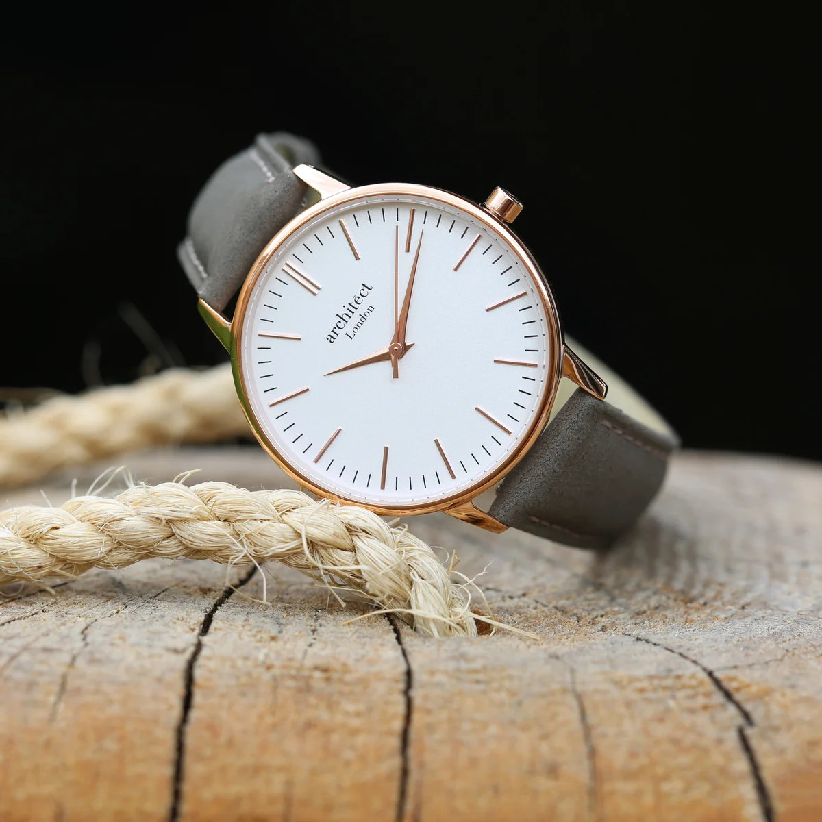 Ladies personalised watch with light grey leather strap and polished stainless steel case on white background