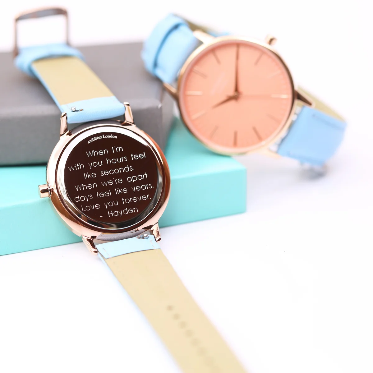 Ladies coral watch with apricot dial, light blue genuine leather strap, stainless steel case, and modern font engraving option