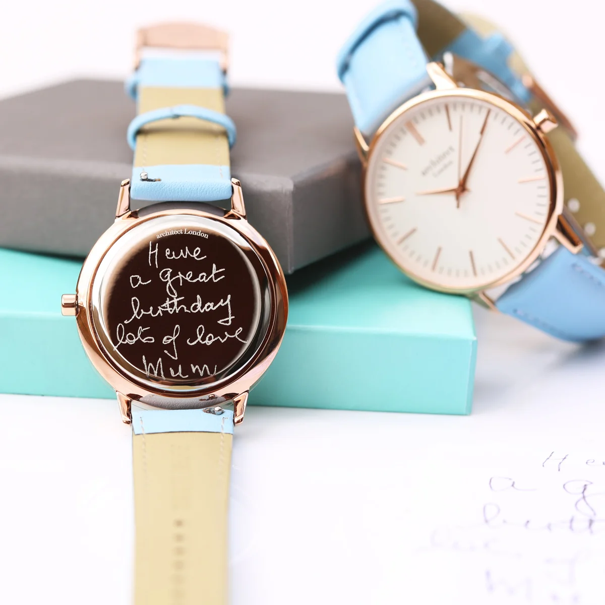 Ladies Architēct Blanc handwriting engraved watch with polished stainless steel case and light blue genuine leather strap