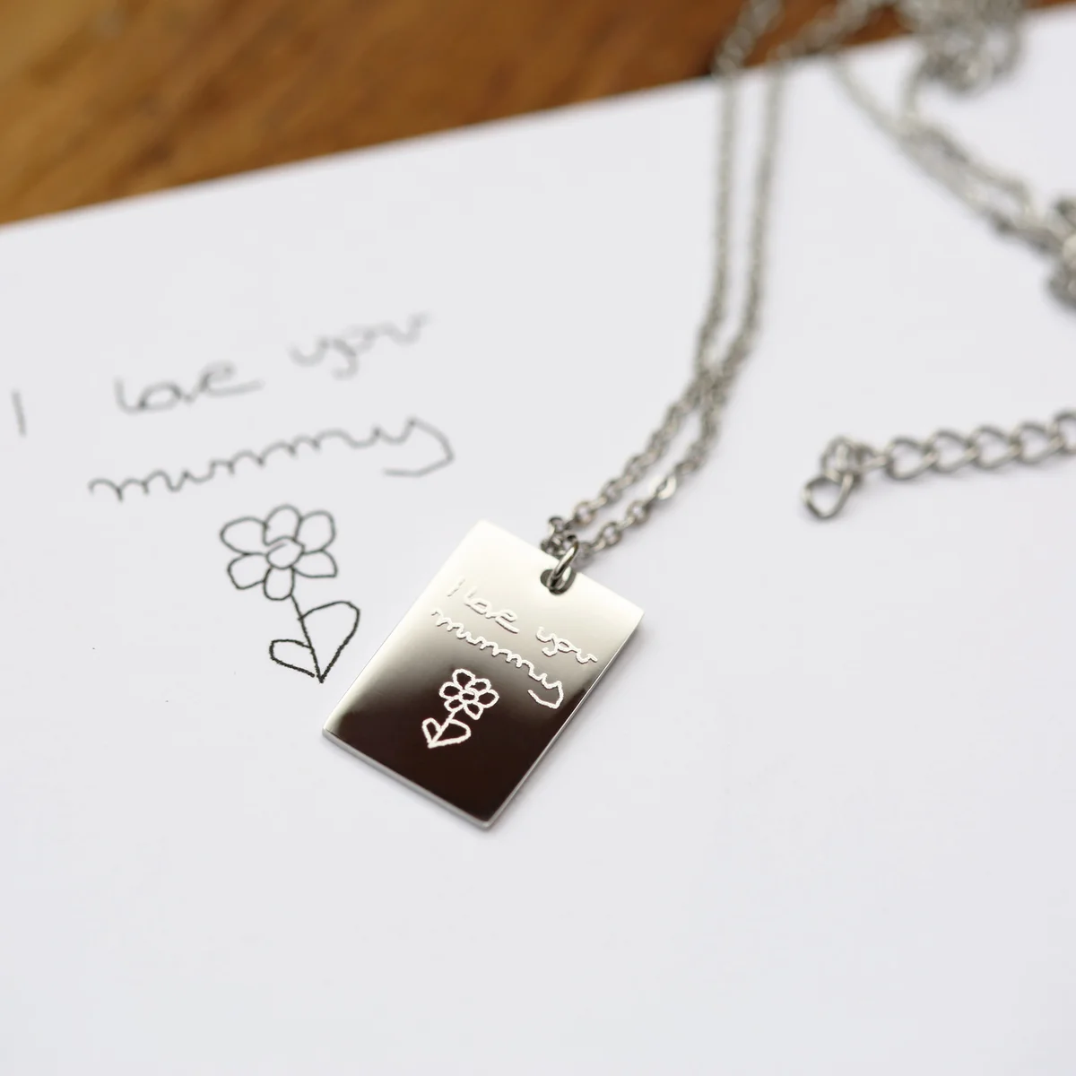 Dazzle personalised handwriting necklace in silver with delicate engraving on a 48cm chain displayed on white background