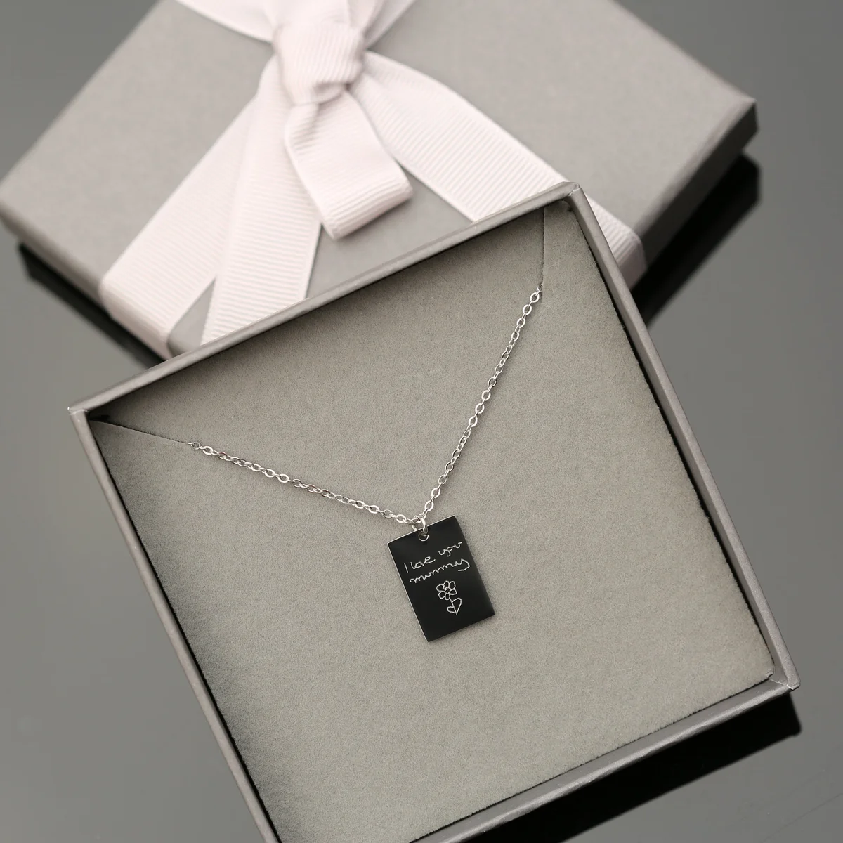 Dazzle custom engraved necklace in rose gold with handwritten message on 19mm x 13mm pendant and 48cm chain in gift box