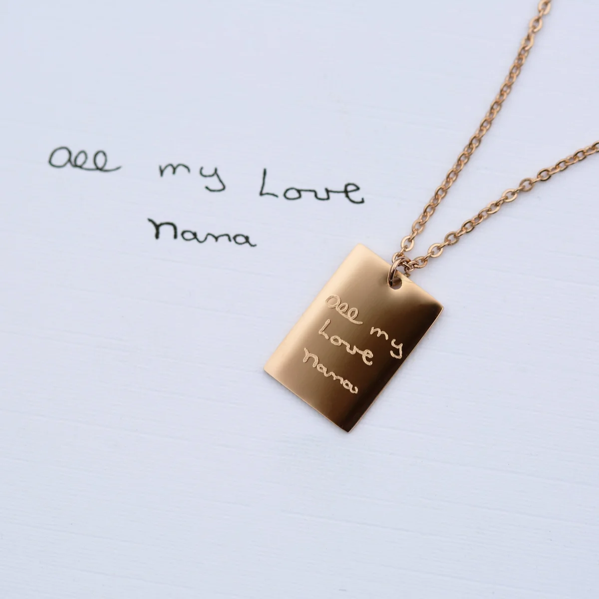 Dazzle personalised handwriting necklace in rose gold with engraved message on a 48cm chain displayed on white background